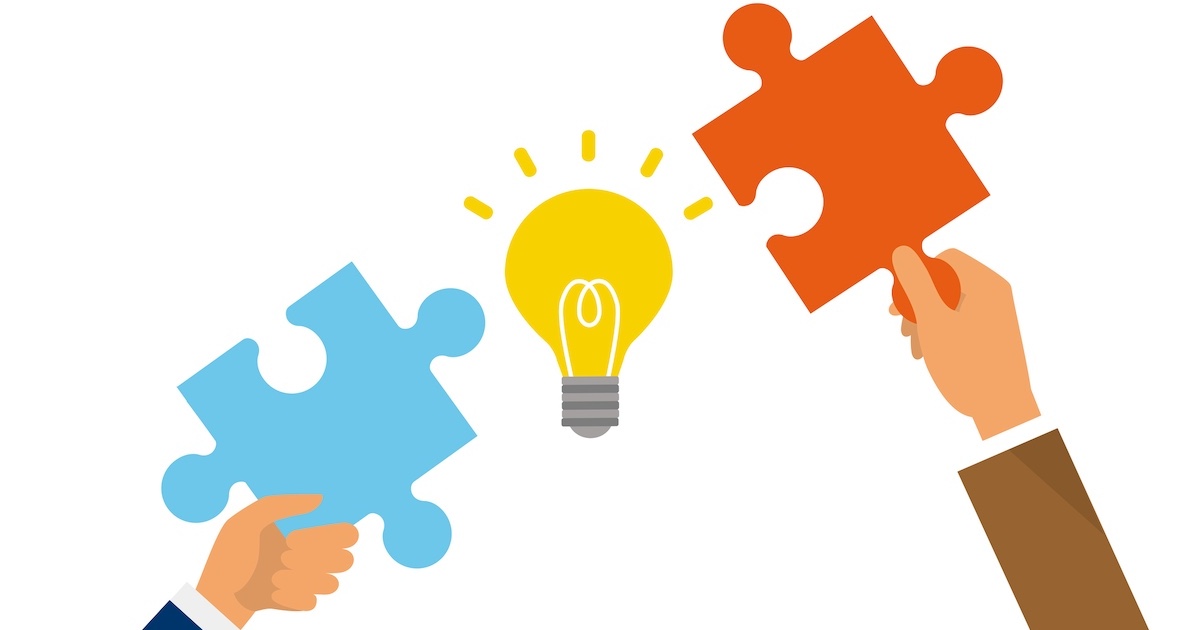 2つのパズルのピースがはまるイメージ