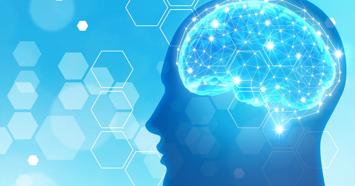 青い背景に、脳が光る横顔のシルエットを描いたイラスト